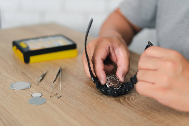 Evil eye bracelet repair - a person fixing a broken bracelet