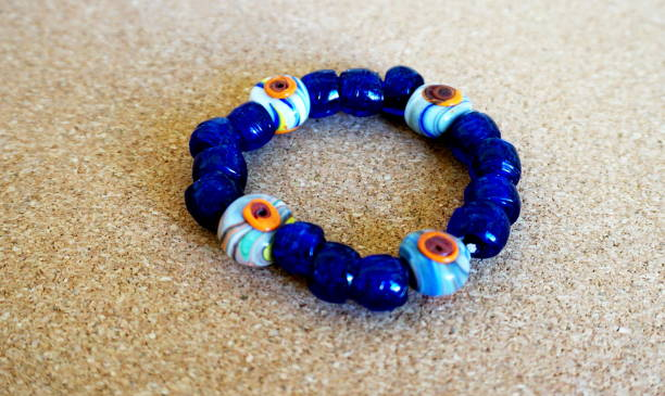 How to fix a fallen evil eye bracelet - a close-up of a damaged bracelet